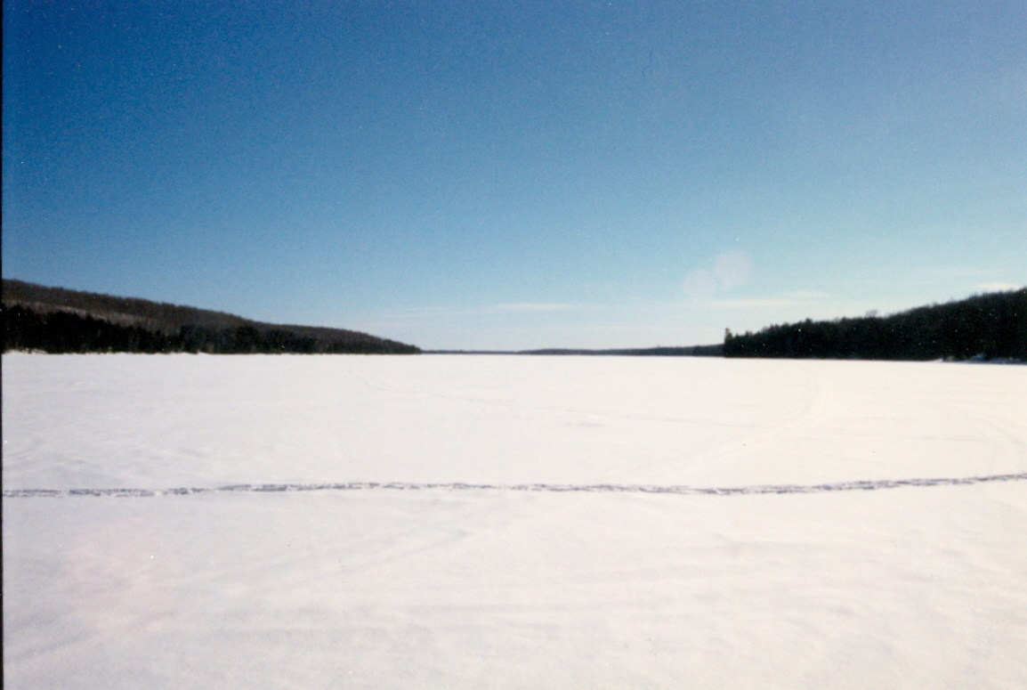 There's plenty of ice on the lake and plenty of comet in the night sky. There's also plenty of cold but there's less snow than usual. Let's hope that does not affect the lake level this Summer. We'll be back in a week to see the comet again and check the ice thickness.<br><br><br>-Nemo: Fisherman, Skywatcher, Goofball