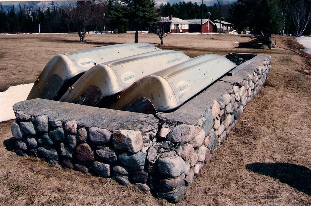 Timber Shores' fishing boats for cabins 1, 2, and 3 made it through the Winter in what's left of one of the lake's oldest cabin remnants.