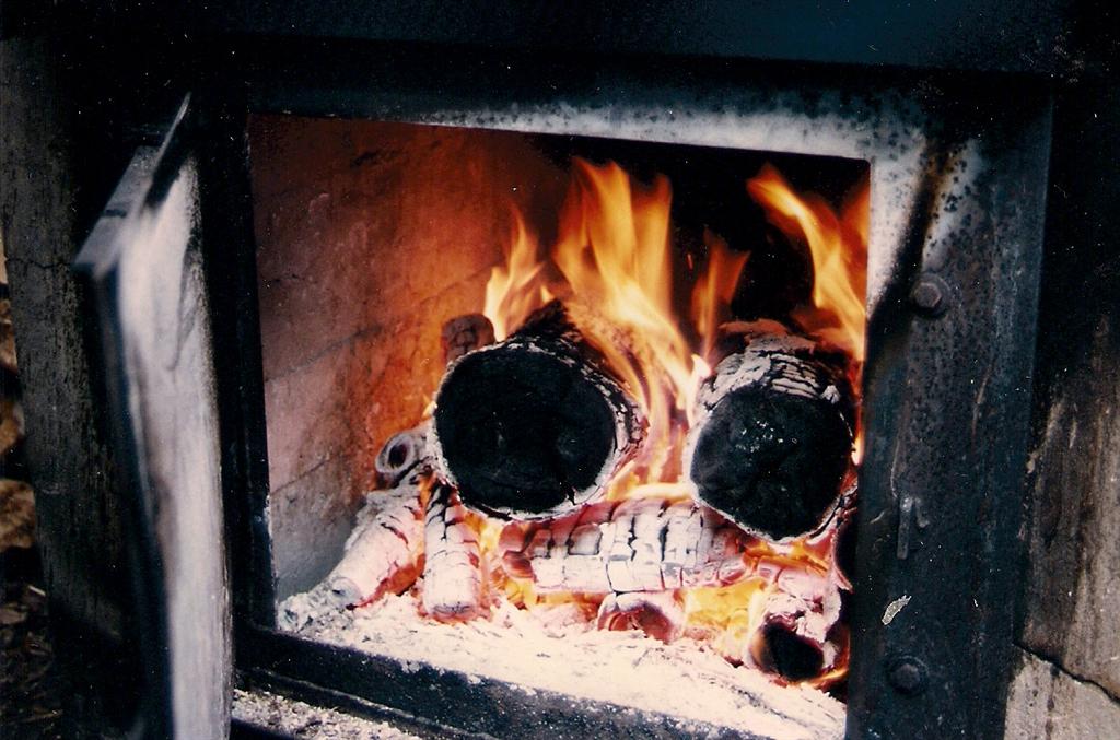 Stuffed fireboxes are boiling the collected sap down to pancake topping.