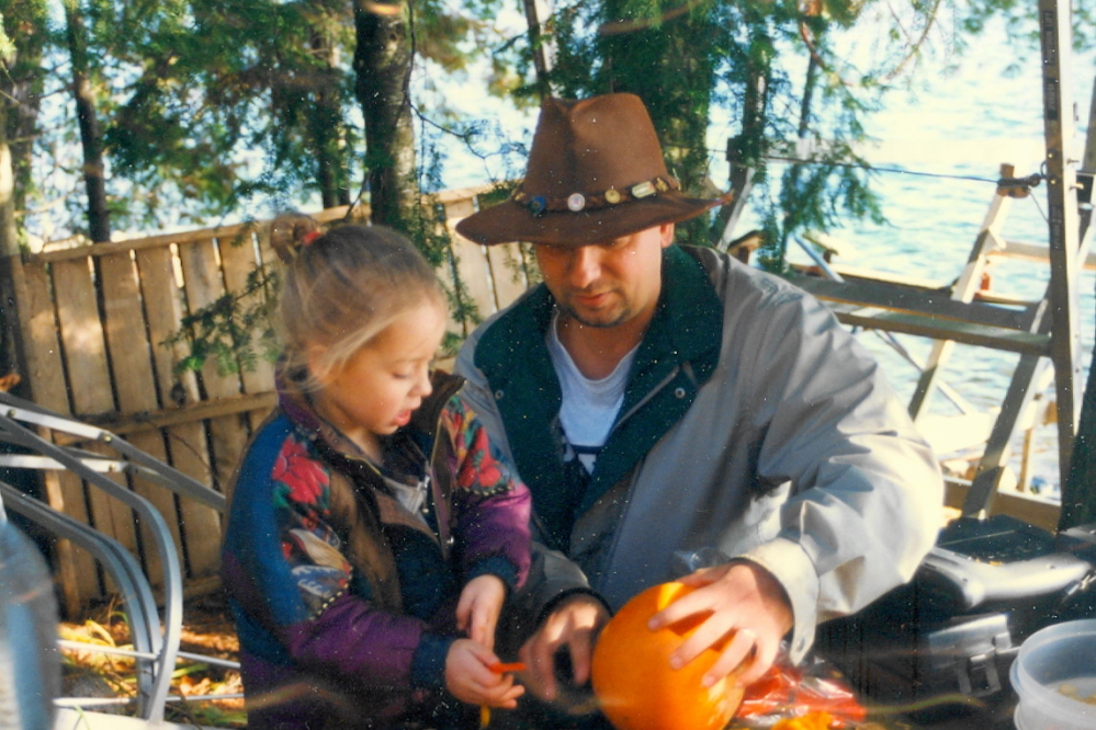 The smaller handed used uncles to properly brace their pumpkin for safe cutting.