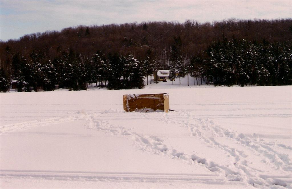 Our first attempt at a fort form created a block of snow 4 feet high, 4 feet wide, and 8 feet long. It took much of the day to create one wall. We've got to small up this form in the future
