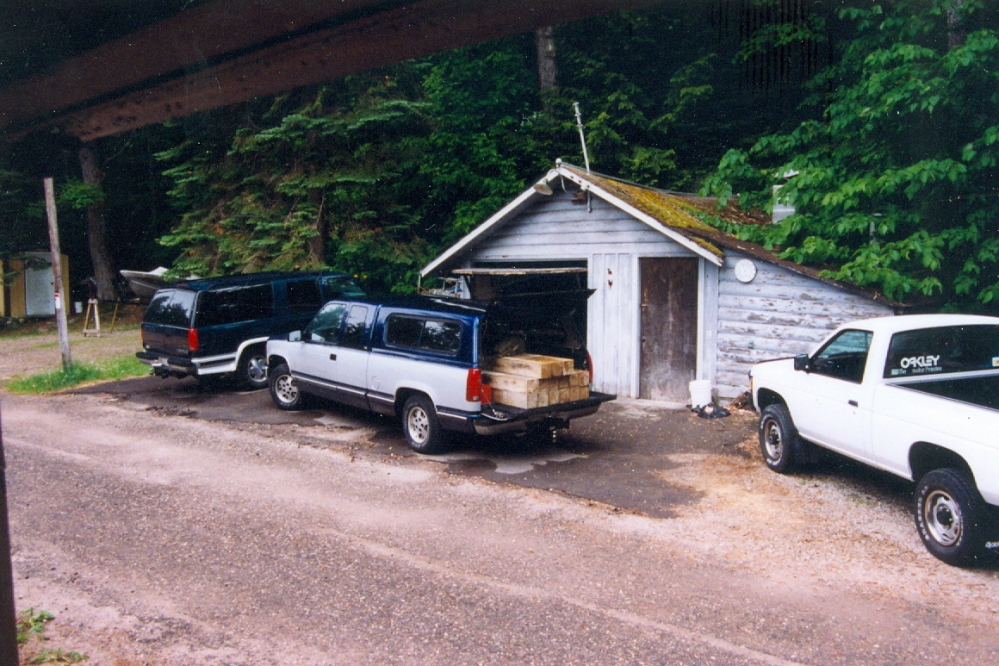 The weather was nice when we arrived on Friday. That changed. Saturday was cool and rainy, but that did not dampen the spirits of the men. We were up to bring stuff and stuff was brought up.  Landscaping timbers, plastic sheds, and other bric-a-brac were unloaded in the rain.