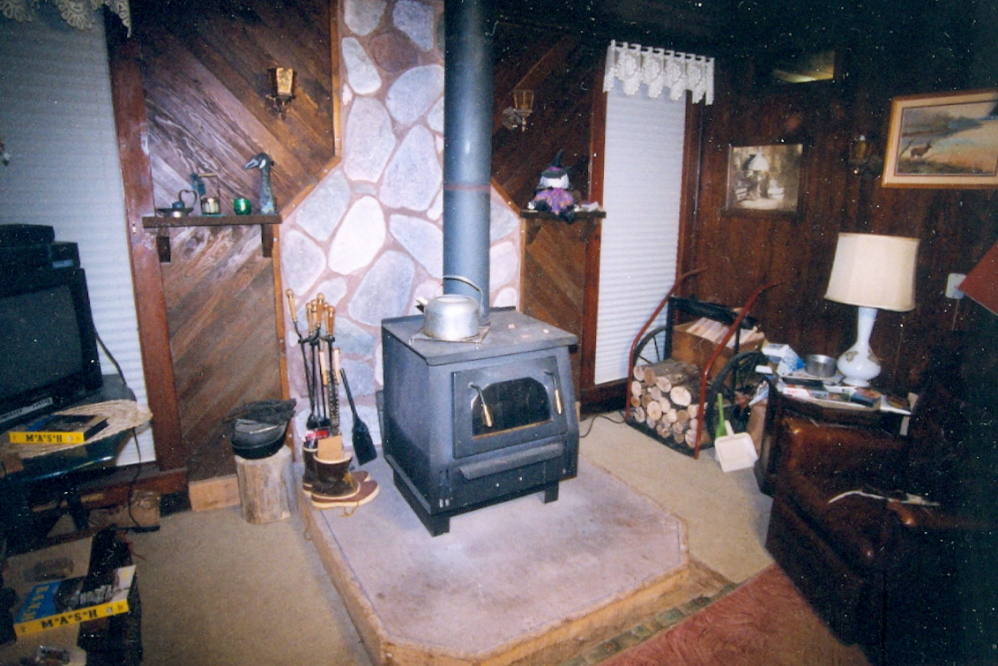 Back in the cabin, the men were putting some finishing touches on the installation of a wood burner. No out of the water shivery card games for us,  even in January!