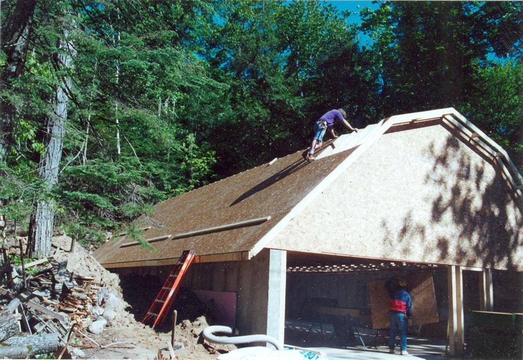 While standing on Knott Lane, roofers tried to persuade us that flinging sheets of OSB up to the roof was going to be the next big trend in extreme sports. They failed to convince us.