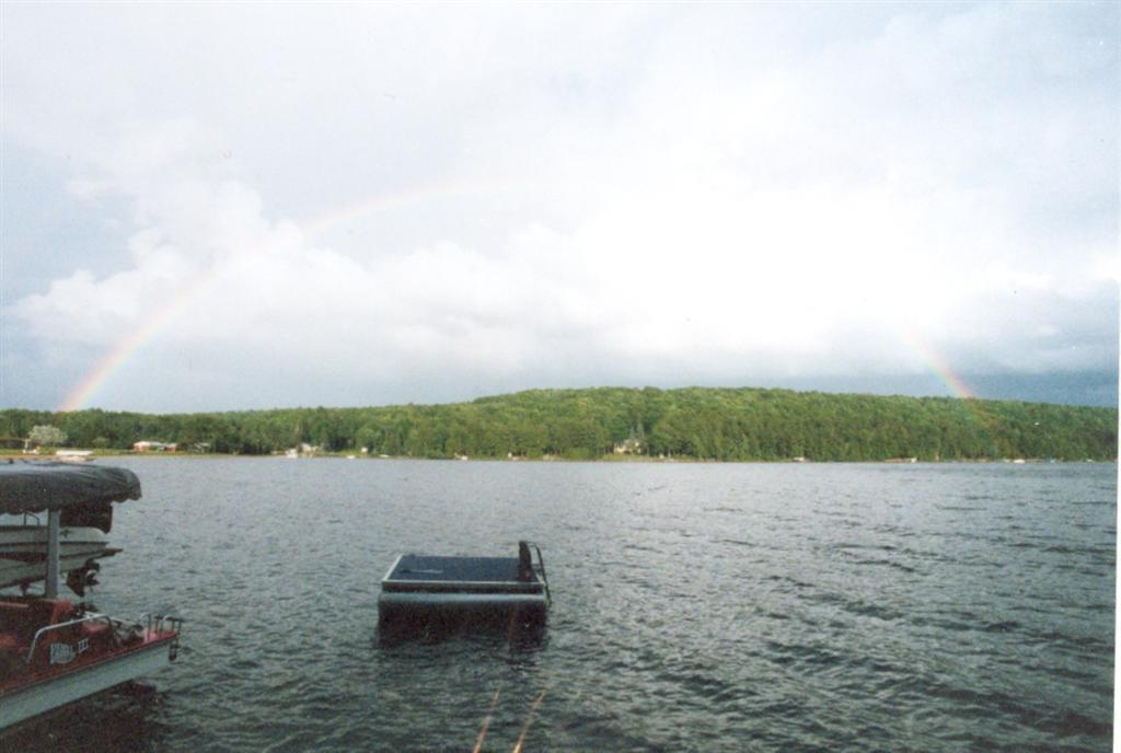 It has been a wet and cool week. The water temperature never went above 69°F and the wind would just not stop. There was also a rainbow.
