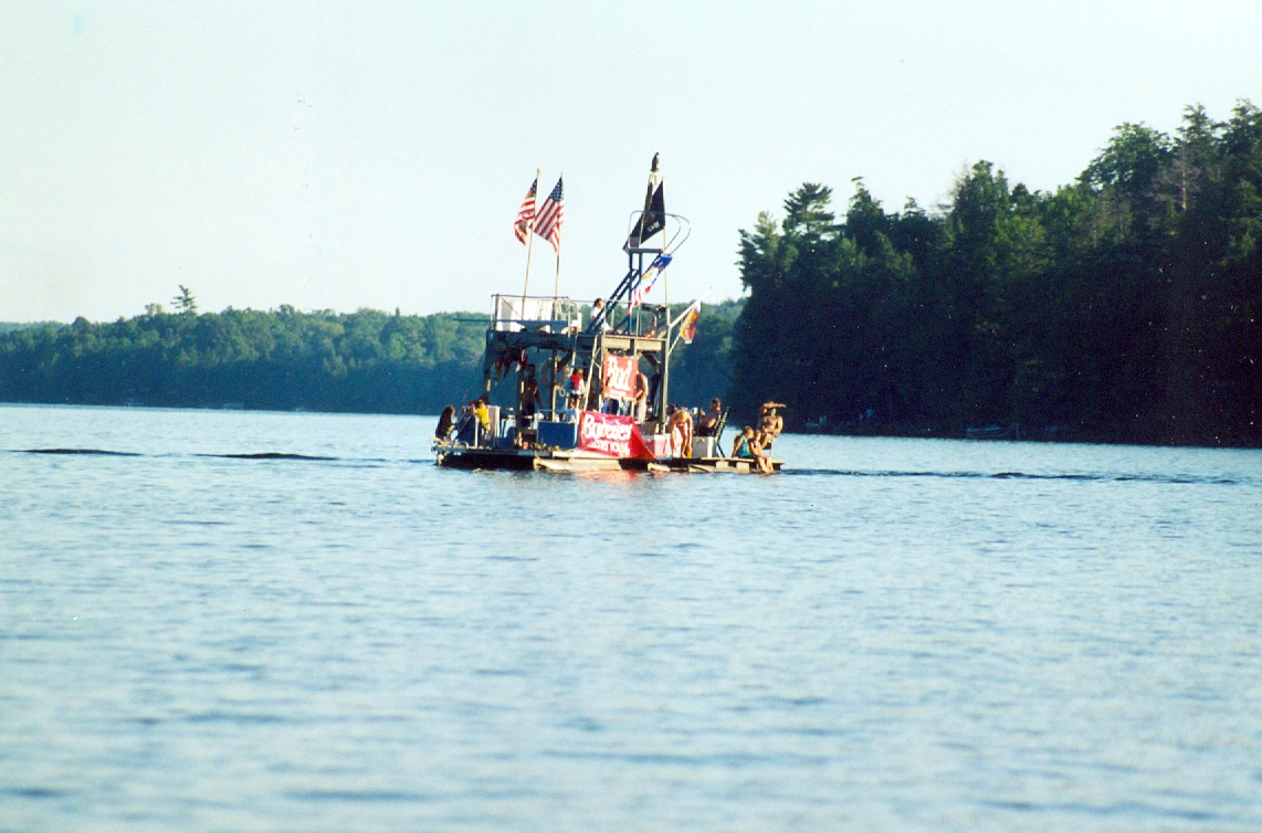 It's been rumored that there is a giant pontoon boat crusing around on Lake Lucerne. The reports are true. We caught a glimpse of the custom made beast as it slowly made its way around the north end of the lake. Wow.