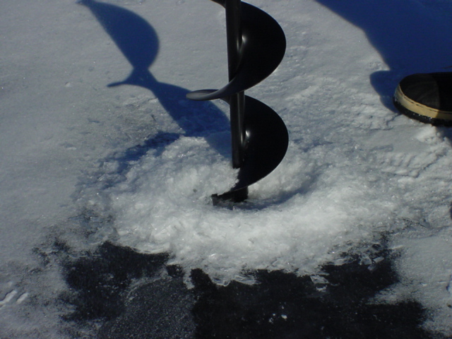 The last thing to do was to drill a hole to measure the thickness of the ice.