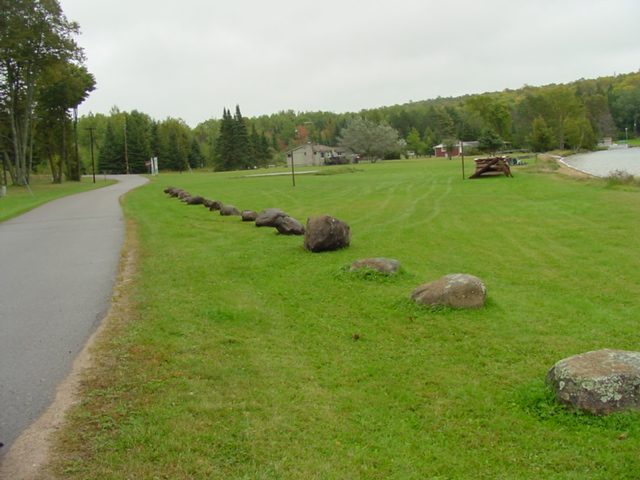 Rocks were added to  the side of the road on the north end of the lake.  These join the few that have been there for over 3 decades.  The water was to rough/cold/wet to ski so we enjoyed (endured) 27 holes of golf.  Next week, we'll ski more and golf less.<br><br><br>-Nemo