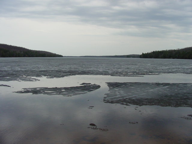 The rain, wind, and heat have taken their toll on the ice.  When we arrived late  Friday afternoon the lake was liquid around the edges.
