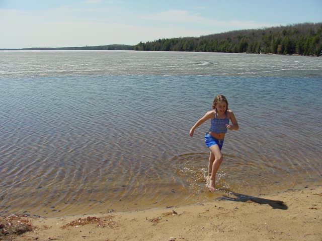 The weather was so hot my niece and I decided to go for a swim.  After diving in I almost made it to the ice before sprinting back.  Victoria bolted back a bit sooner.  April 17th is the earliest I have ever went into the water over my head.  I don't plan on doing it again soon,  the water is pretty cold this time of year.