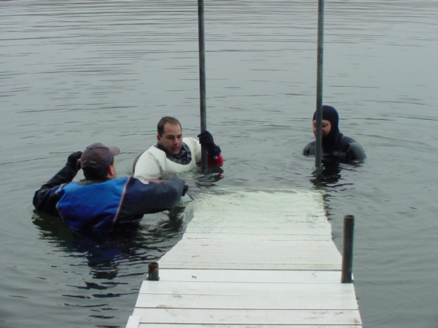 After the nubbing, piers were put in.  The water is 50°F, very refreshing.