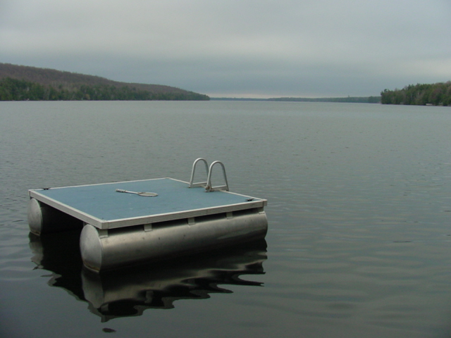 With the piers, boats, and raft in, our mission was accomplished.  With more rain on the way and the lake temperature "nippy" we chose to leave a day early.