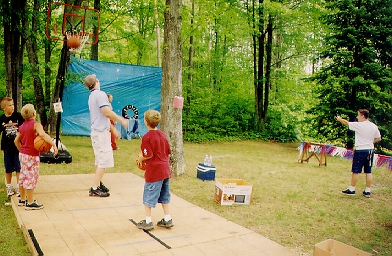 The basketball contest was augmented with a football throwing event.