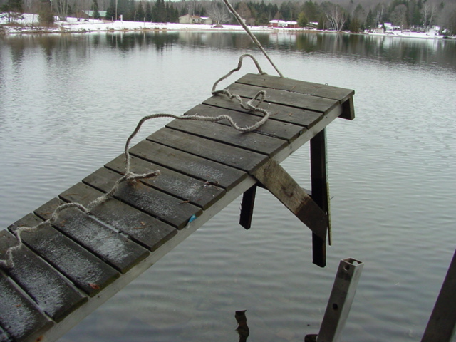 On Saturday the last pier was lifted from the 34.7 F water.  The final lake level measurement is 7.5 inches above the nail, the highest ever for this time of year since the inception of the nail.  Watch for shrinking shorelines next spring.