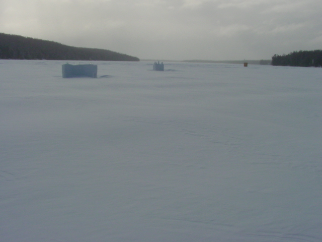 The surface of Lucerne is covered with snow dunes that are about 2 feet deep.  The snow between the crests is half that.  Two weeks ago the lake was covered with a uniform inch of powder.