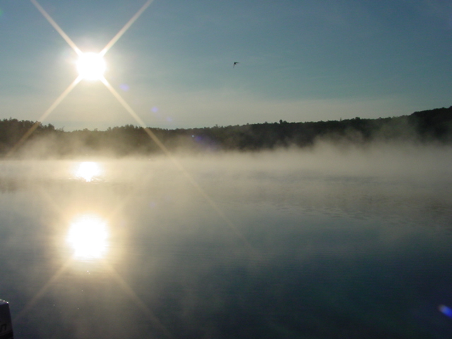 Saturday morning started off wind-free as the lake gave up it's heat after a cool night.