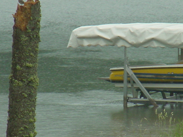 There was some rain but not enough to bring the lake back up.  It remains about 3 inches below the nail.
