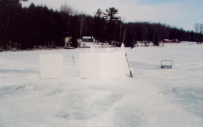 By Saturday afternoon, the four forts were almost complete.  Ours featured a "floating wall", firing slits, and some abusive top decorations.