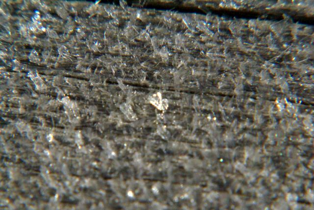 Frost covered the landscape on Saturday morning.  The ice in this close up of some deck boards was baked off soon after by the surprisingly warm sun.