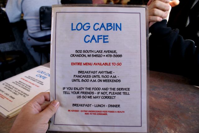 After a brief negotiation, it was agreed to breakfast at the Log Cabin Cafe.  The special was a ham and cheese omelette, potato, and toast.  No pancakes were eaten.