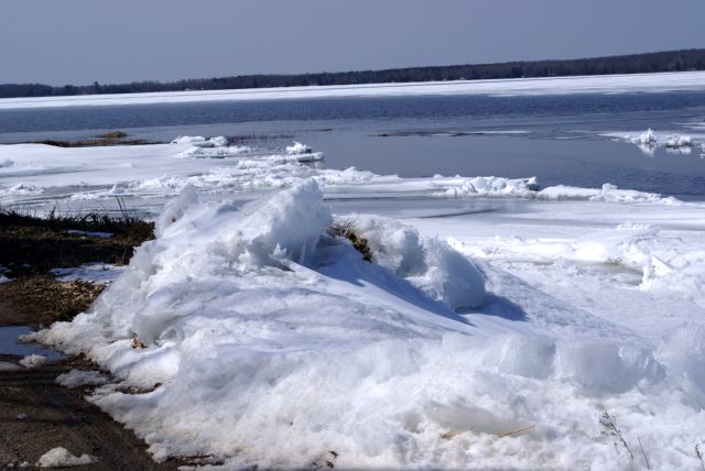 The ice is piling up on the downwind shores of Lake Metonga.  The road on the east side of the lake had been covered in past years but was open this spring.