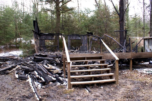 After coming back to Lucerne and cleaning our shoes, we checked out the cabin that burned down last Wednesday night.  There wasn't much left.
