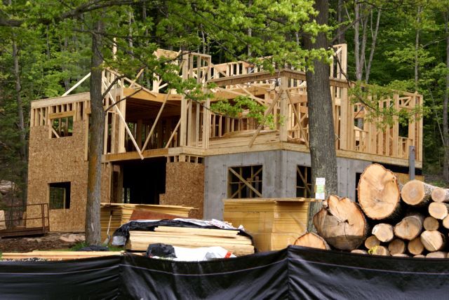 Construction on the eastern house at Timber Shores continues.  Looks like the third floor is halfway up.