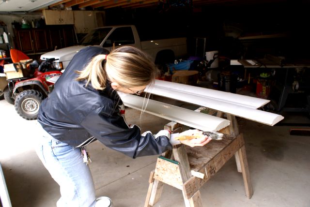 We were so inspired by the new buildings that we cut, sanded, and painted some siding for unsided elements of the bar.  The final color was "Brushed Silver".  The primer was white.