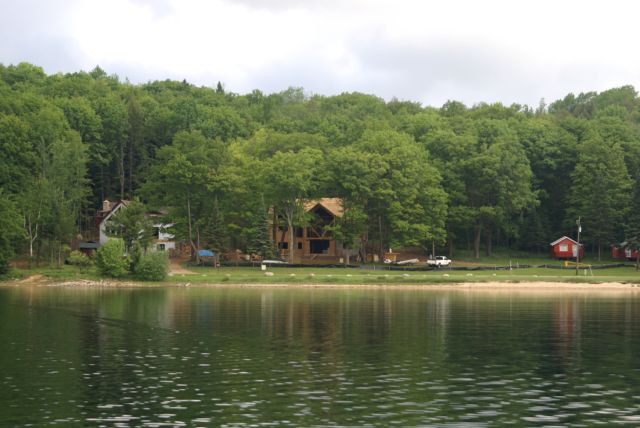 Construction continues to move along at Timber Shores. I found the contrast between the new structures and cabin 2 (the little orange one on the right) stark. I did not get to take more pictures due to the...