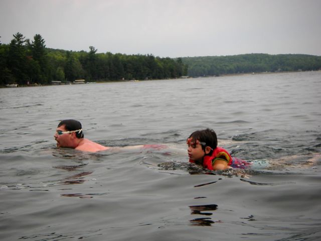 The contestants first swam 0.5 miles across the lake.