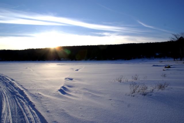 We made it back to the lake just before sunset.  Walking around the lake is hard with all the snow.