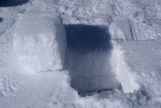 The snow on the lake is strong enough to walk on and can be cut into Styrofoam like cubes.