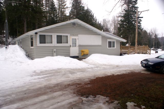 Some of the north end is no longer covered with snow.  Other parts are buried.  While hiking to the ice house, I broke through the snow and sunk past my knee.  I had thought it was only a few inches thick.  Picking snow and ice out of shoes and boots is no way for men to live.