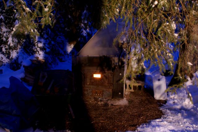 Cylons! No...wait...it's just the aux cooker being fired at night.  Krispa and xLt had to boil all evening to try not to fall too far behind the flood of sap from the maples.