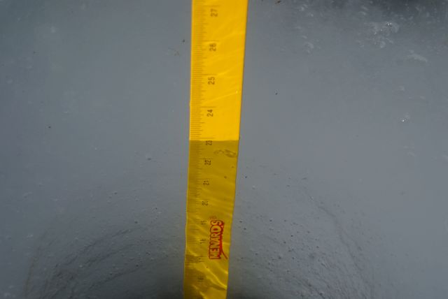 The ice was 23 inches thick on Sunday.  I wrote 22 inches on the ice mostly because I had such a good time making the first giant "2".  With the warm weather, the ice should be below 12 inches by next weekend.