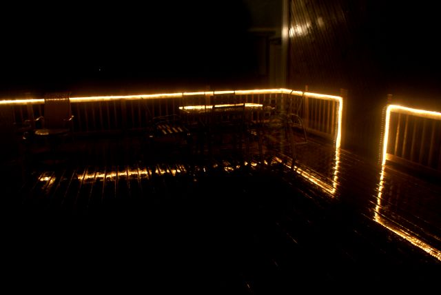 Rain on Friday night, reflected the lights and pushed the lake level up a bit.