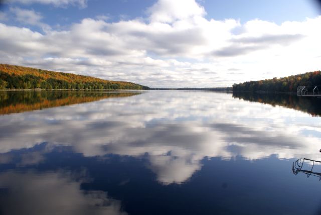 The sky cleared on Sunday afternoon and the lake became very photographic.  On the surface of the north end, the only waves came from a loon and a passing pontoon boat.  We'll be back next weekend, just after peak but just before the snow.<br><br><br>-Nemo
