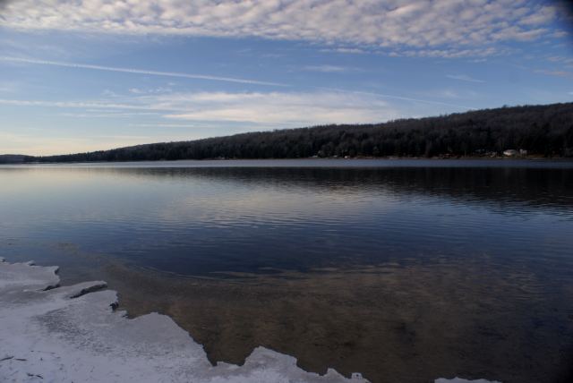 On Saturday morning, ice was growing from the shore in the NE corner.