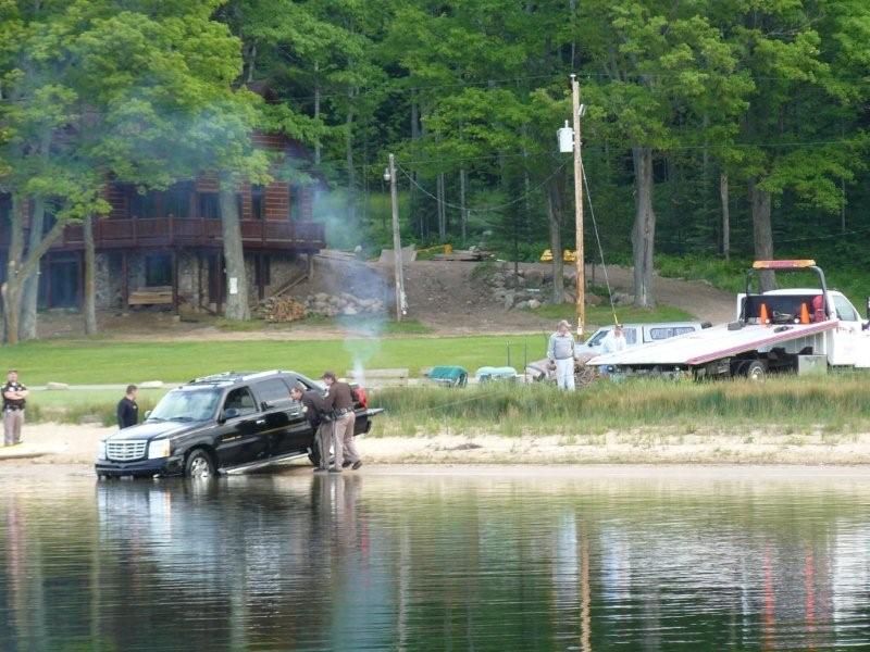 A resident spoke to the Washington County Sheriff Monday.  There was some speculation that the vehicle may be the one  involved in a drive-by shooting in Slinger.  Later it was found to be a boyfriend/girlfriend break-up situation.  The angry party took the vehicle, put a stick between the accelerator pedal and the seat and let it go into the lake.<br><br><br>-Nemo