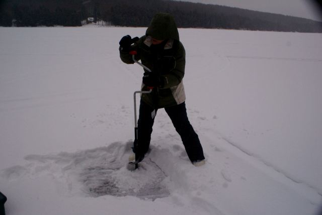 On Sunday, the ice thickness was checked.  Mrs. Nemo had the honor of drilling the hole.