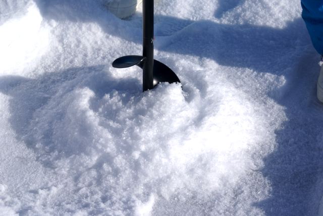 Before leaving, a check of the ice thickness was in order.