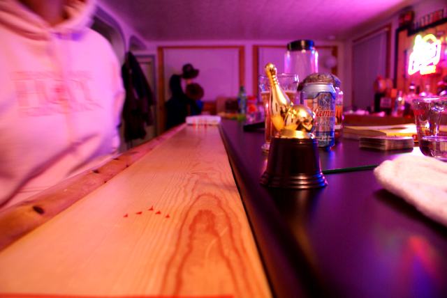 A few frames of bar rail bowling were played for the coveted "Planet's Cup" shown here just right of center.  None had the skill/luck to wrench the much sought after trophy from its barside home.