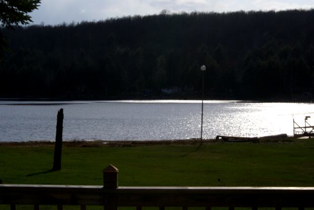 Sunlight was dancing on the lake's surface during the early evening on Friday.  The lake was blessed with a few small sunshowers until the sun went down.