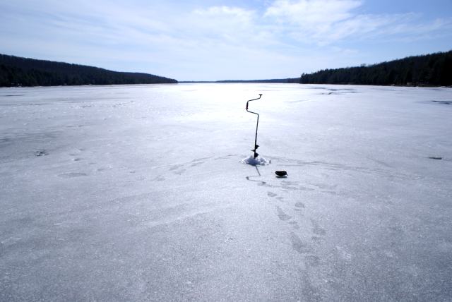 The weather has not been kind to the ice.  A hole was made to check the ice thickness on Sunday.