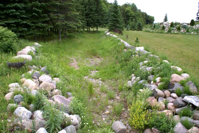 I wouldn't expect the watershed to raise the lake further.  The dry ground held onto the precipitation tighter than a barefooter to a tow rope.  After 1.1 inches, the stream on the north end remains mostly dry.