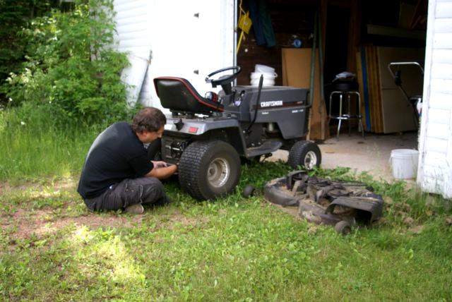 the ceremonial fixing of the lawn tractor.  The grass is again short on the north end of the lake.