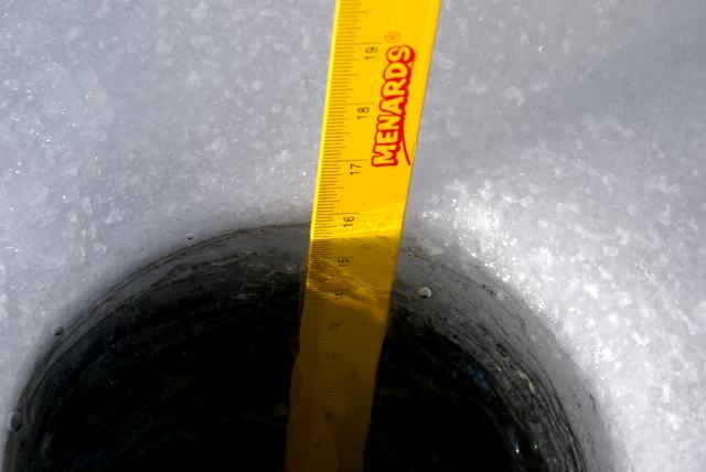 About 16 inches.  That's thicker than usual for this time of year.  It could grow to a yard thick by March.
