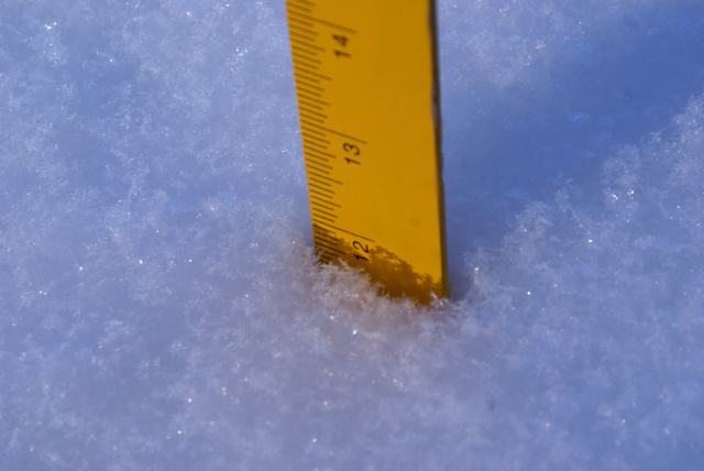 The snow is about 3 inches deep on the lake, 12 inches deep on the bar's deck.