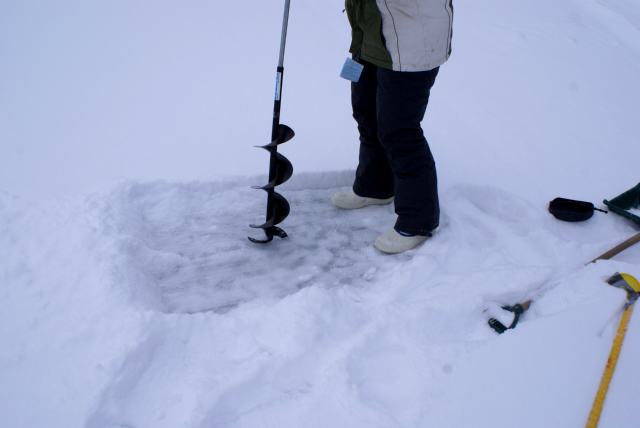 On Sunday we pulled our 34-run sore bodies onto the ice to drill  a hole to get a thickness measurement.