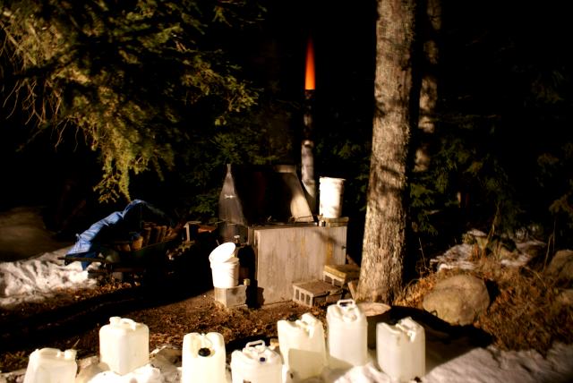 A sap backup meant that the cooker fires had to be stoked all night.  I like it when a really hot fire produces a cone of flame from the top of the stack.